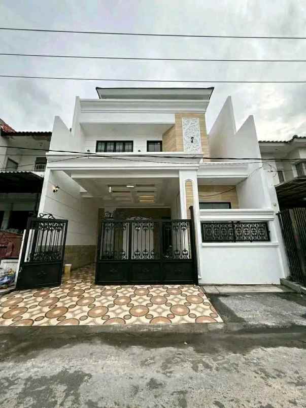dijual rumah babatan pantai