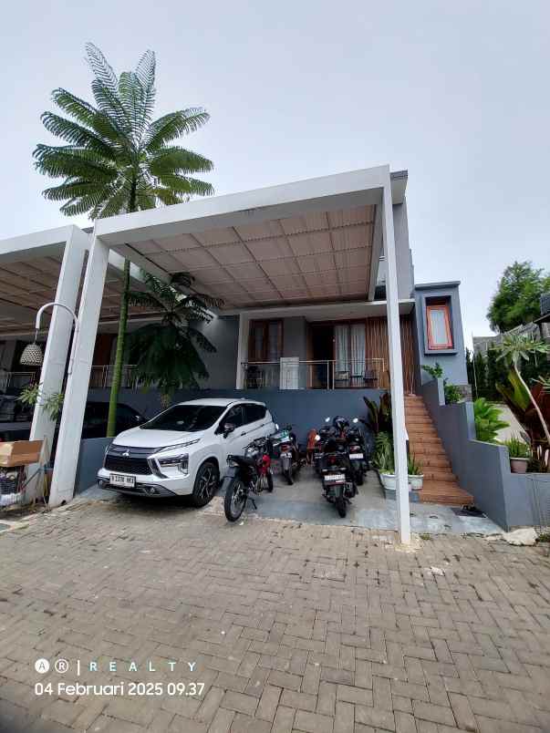 dijual rumah bali garden city view