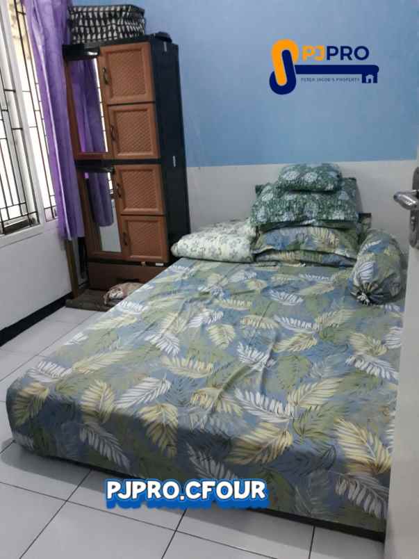 dijual rumah cluster land gardens