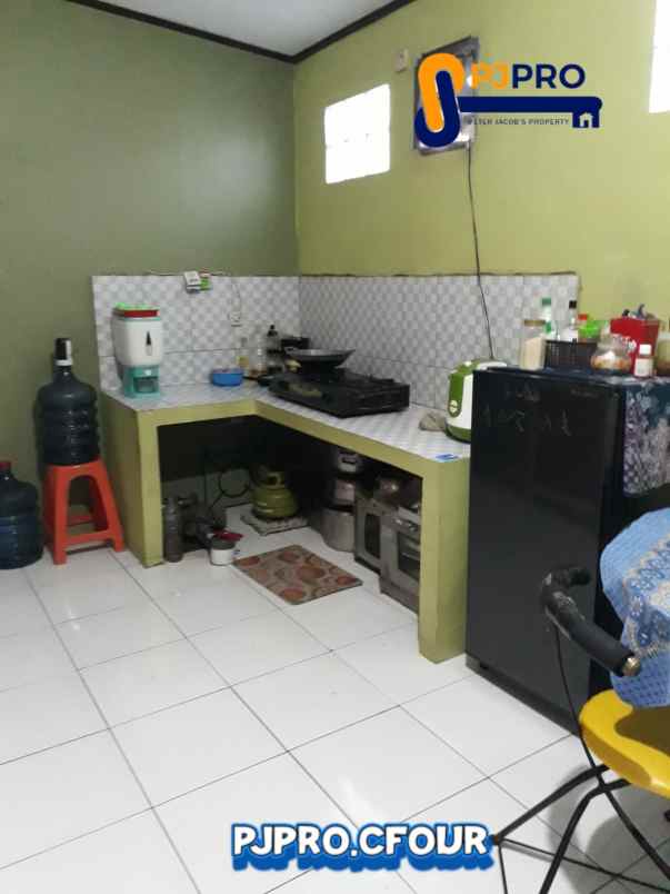 dijual rumah cluster land gardens