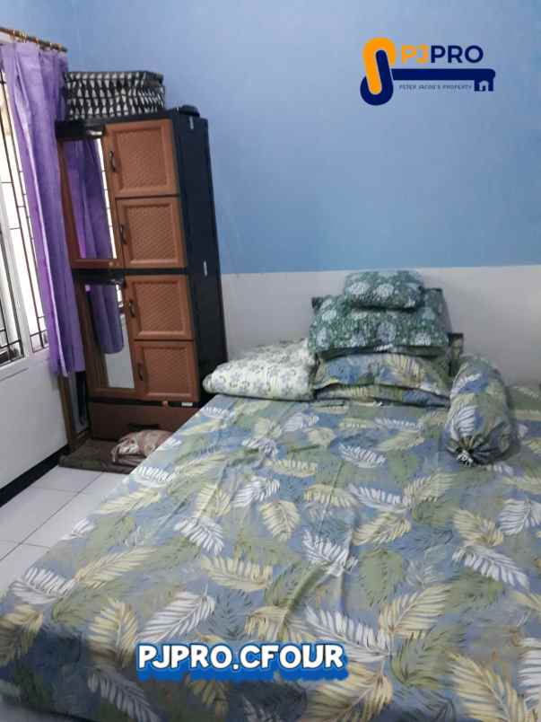 dijual rumah cluster land gardens