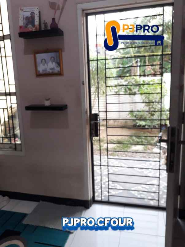 dijual rumah cluster land gardens