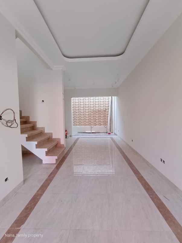 dijual rumah jalan raya kelapa dua