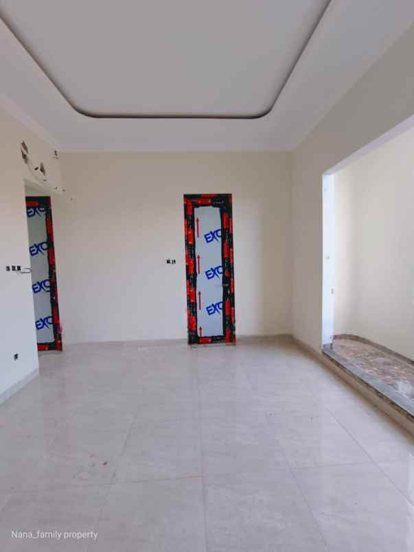 dijual rumah jalan raya kelapa dua