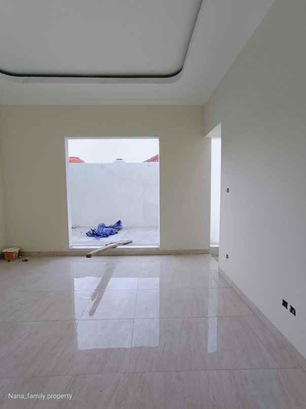 dijual rumah jalan raya kelapa dua