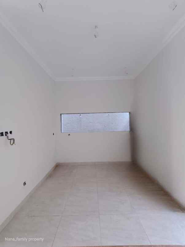 dijual rumah jalan raya kelapa dua