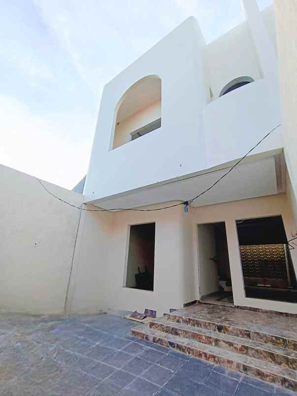 dijual rumah jalan raya kelapa dua