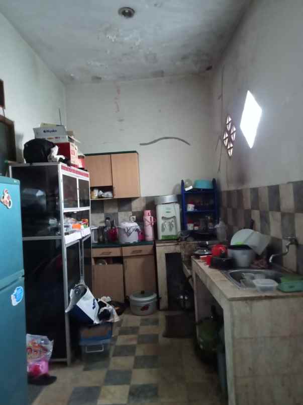 dijual rumah komplek sariwangi