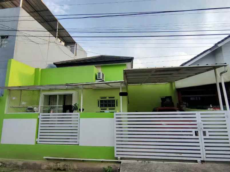 dijual rumah komplek sariwangi