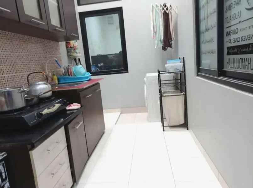 dijual rumah komplek sariwangi