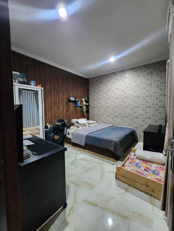 dijual rumah modernland cluster madrid