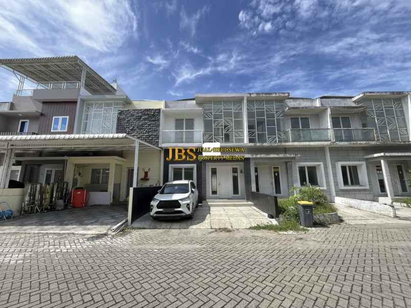 dijual villa komplek graha metropolitan