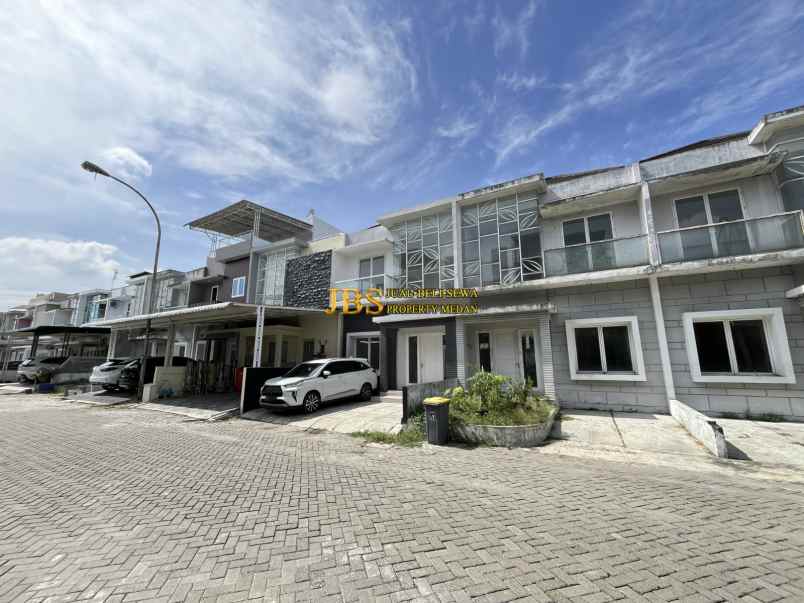 dijual villa komplek graha metropolitan