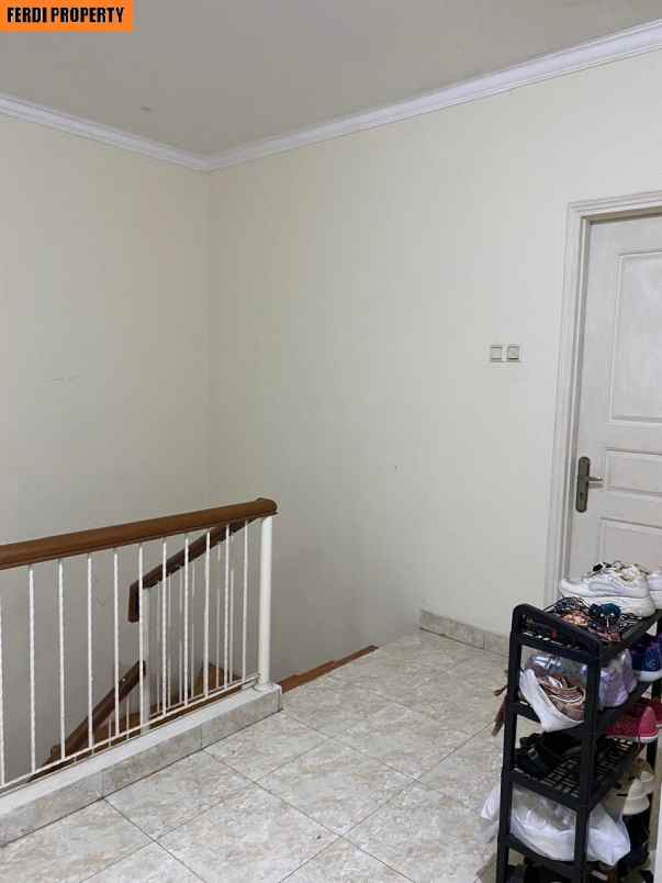 rumah canti 2 lantai raffles hills cibubur