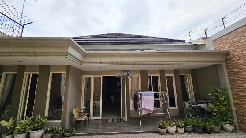 rumah cantik manyar jaya full furnished siap huni