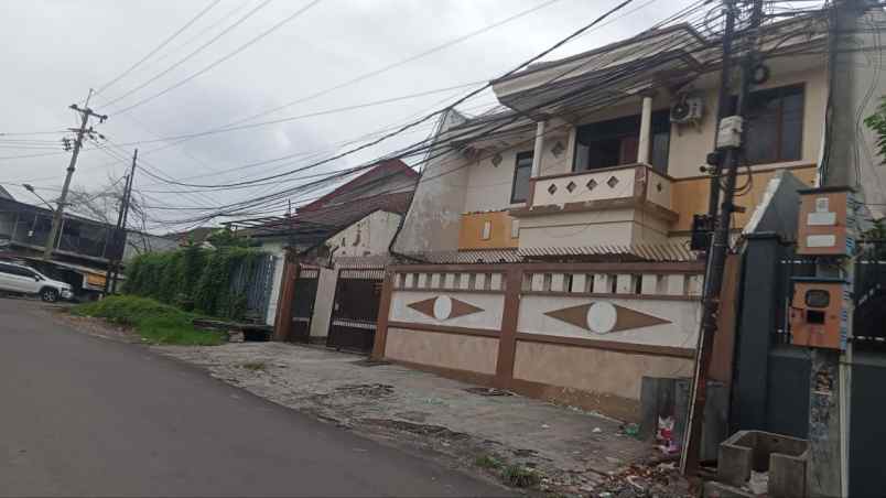 rumah kost dukuh kupang barat row 2 mobil