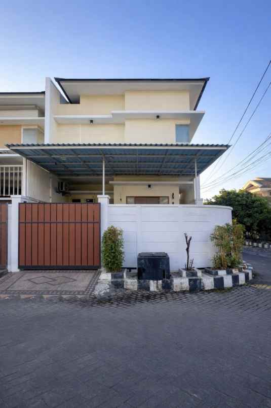 rumah sutorejo selatan hook row 2 mobil carport 1