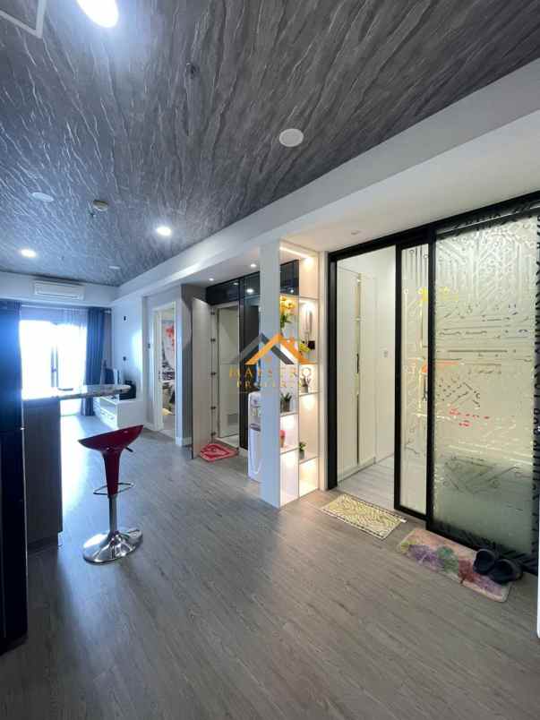 dijual apartemen podomoro city deli tower