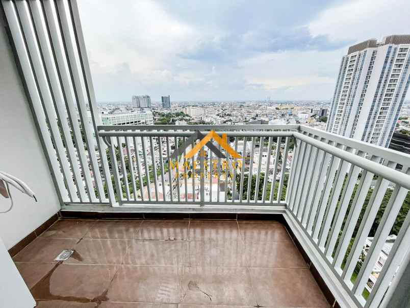 dijual apartemen the reiz condo