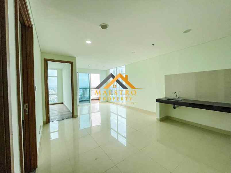 dijual apartemen the reiz condo