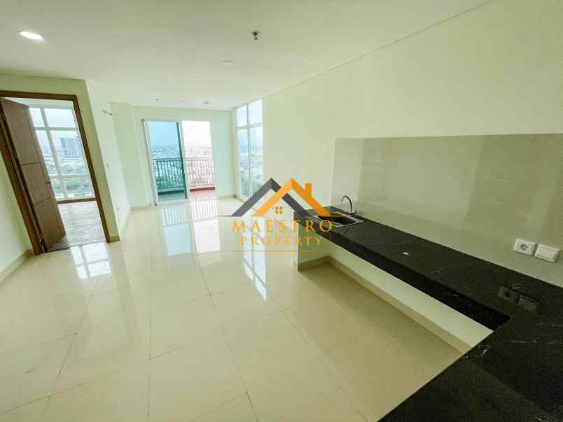 dijual apartemen the reiz condo