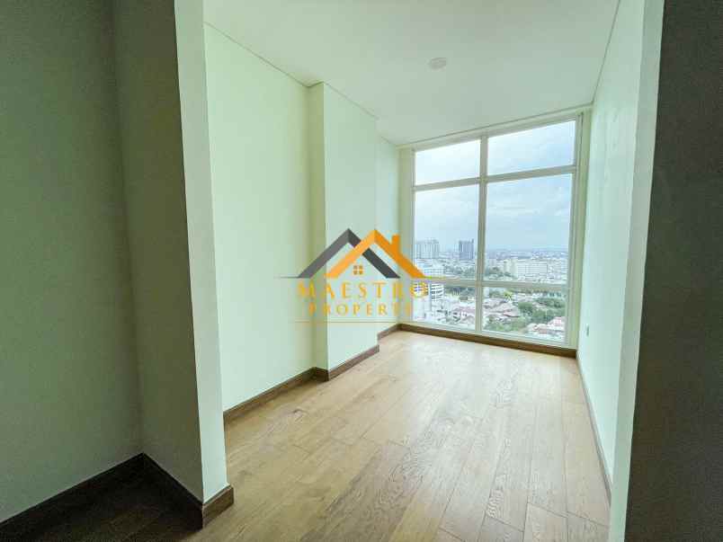 dijual apartemen the reiz condo