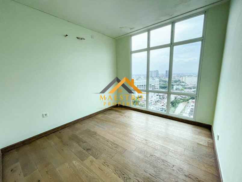 dijual apartemen the reiz condo