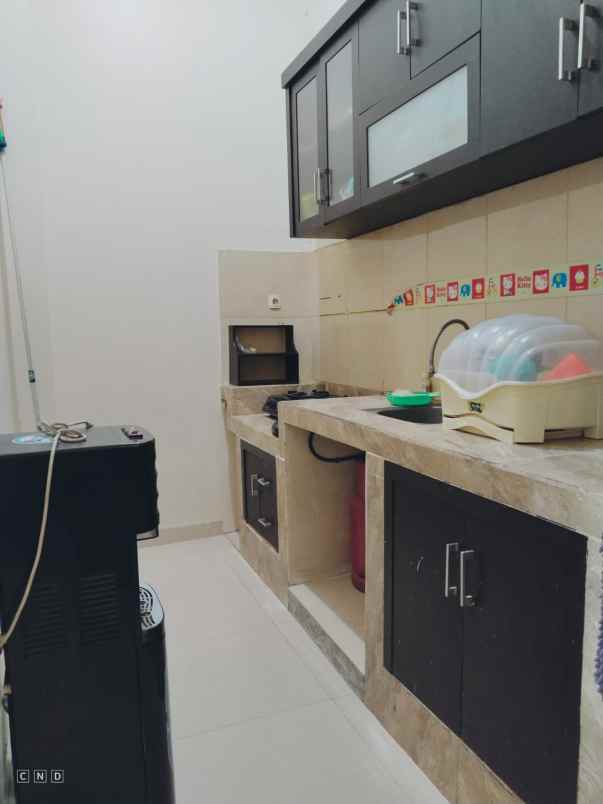 dijual rumah cluster ifolia harapan indah 2