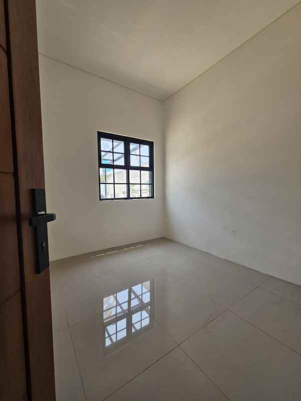 dijual rumah jalan mawar kalibaru