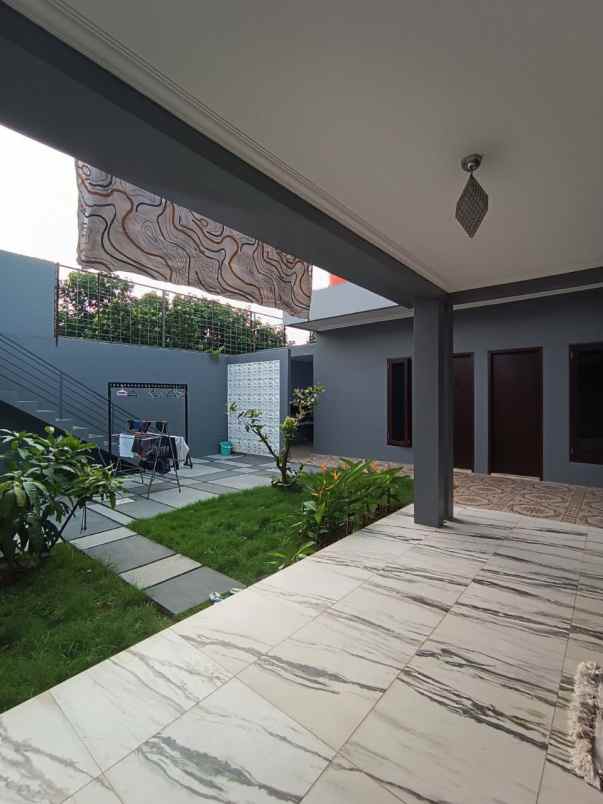 dijual rumah komplek deplu pondok aren