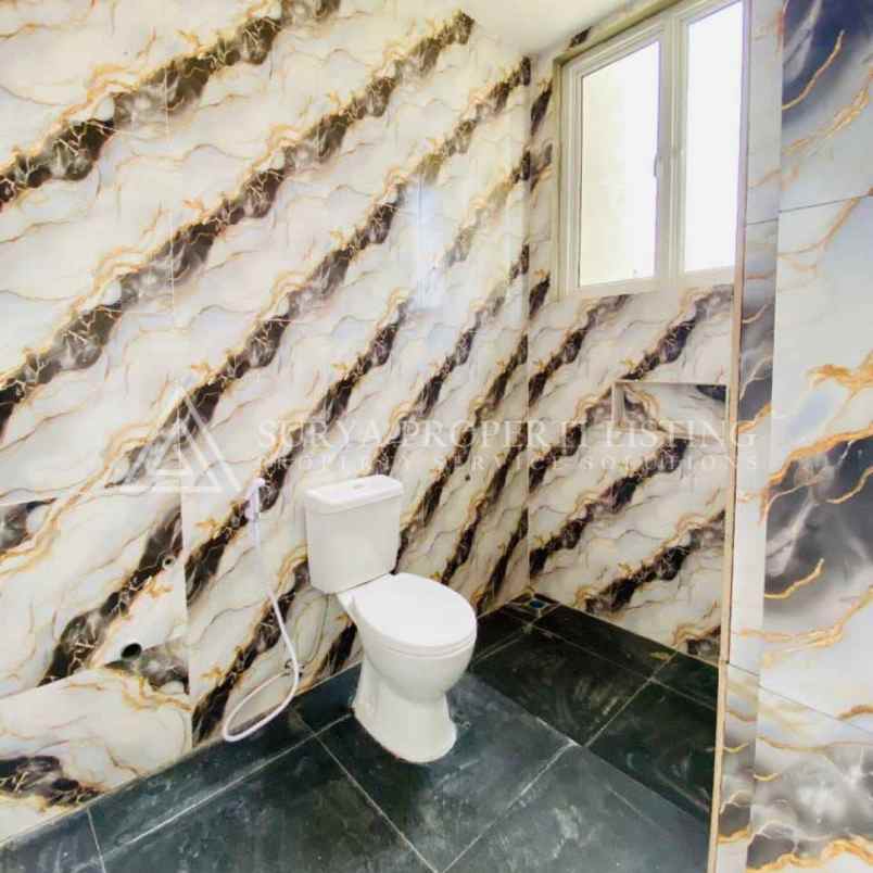 dijual rumah komplek tritura residence