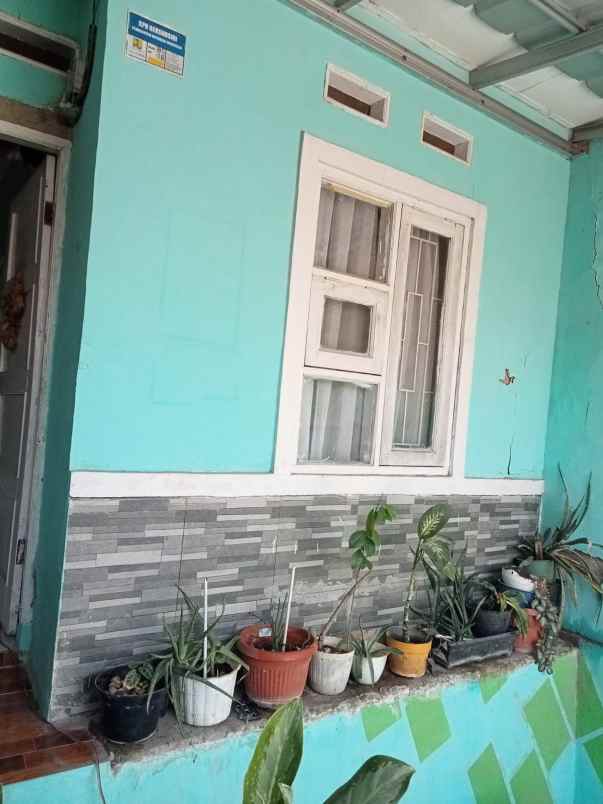 dijual rumah perum bumi kadumekar asri