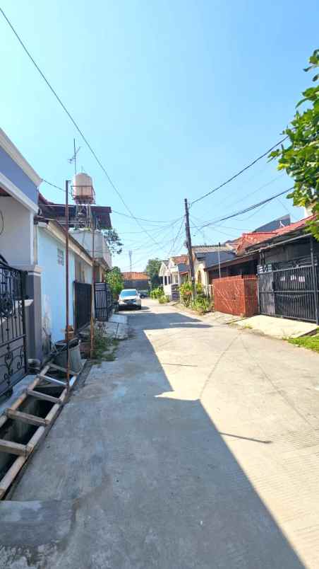 dijual rumah perumahan taman harapan