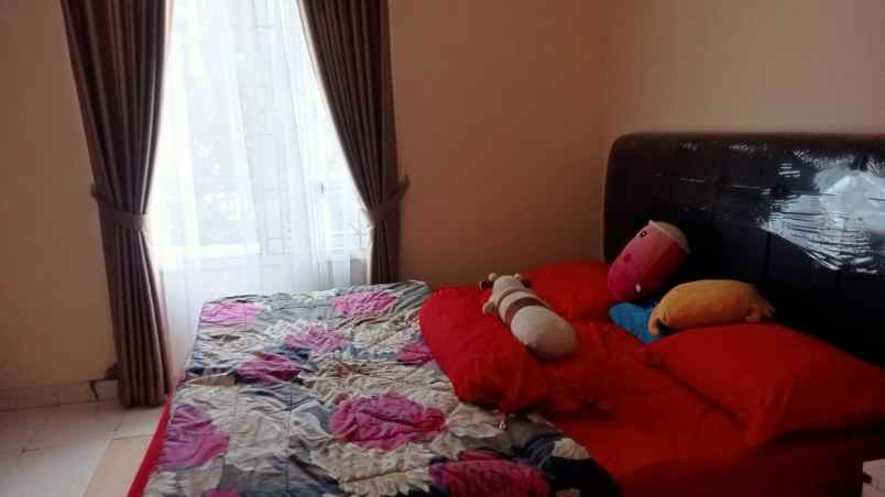 dijual rumah raffles hills housing