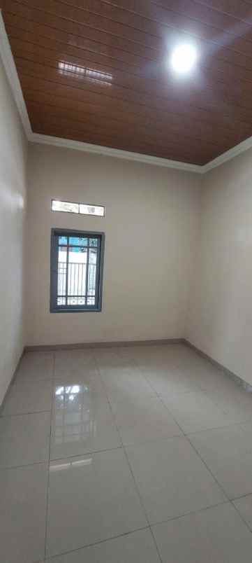 dijual rumah taman harapan baru