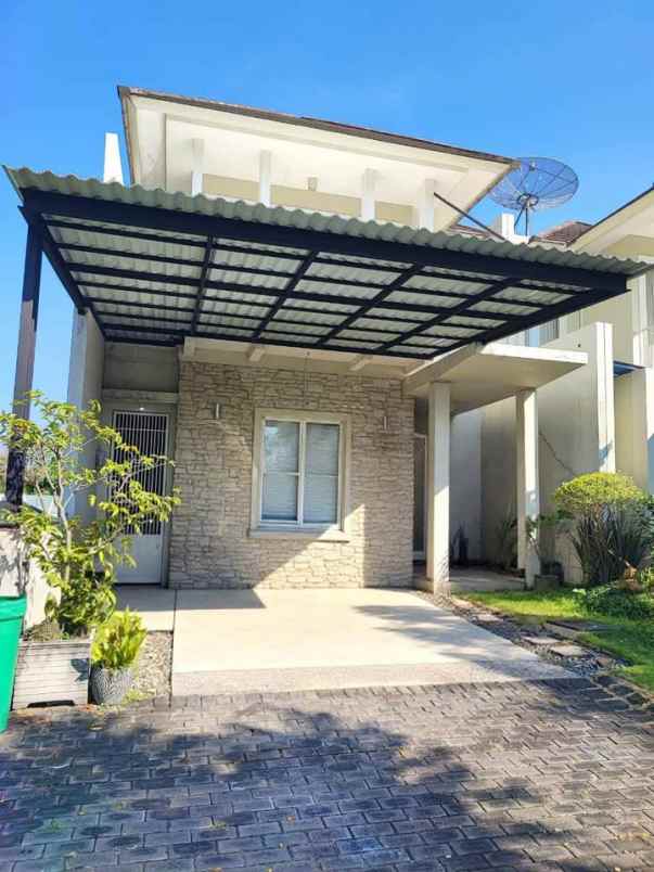 dijual rumah wisata bukit mas cluster rome