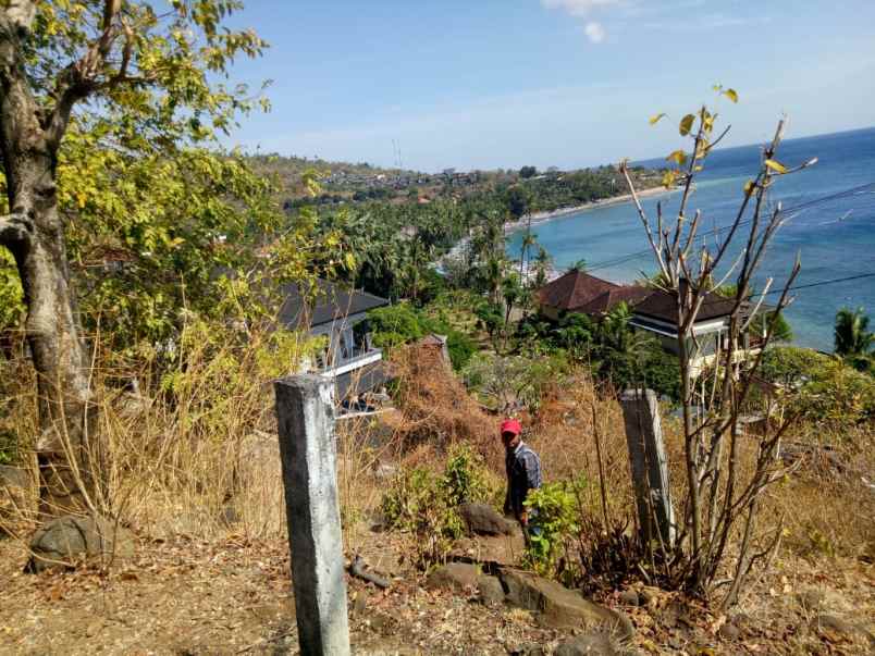 dijual tanah jl raya amed desa bunutan