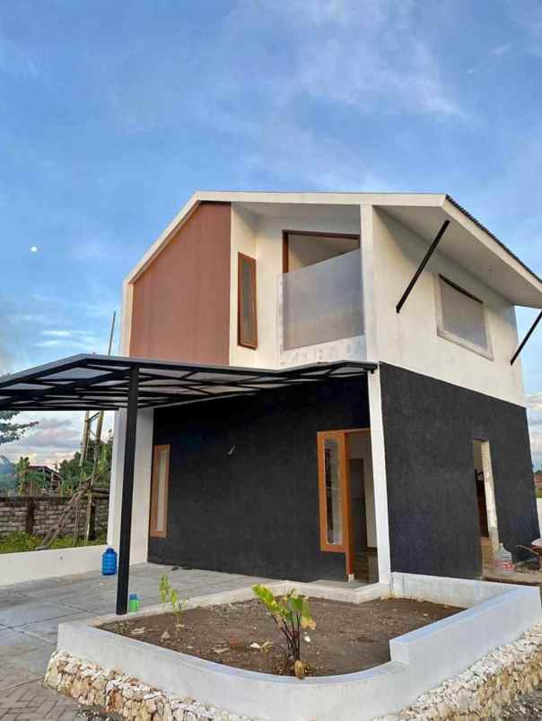 rumah 2 lantai modern bisa cicil developer