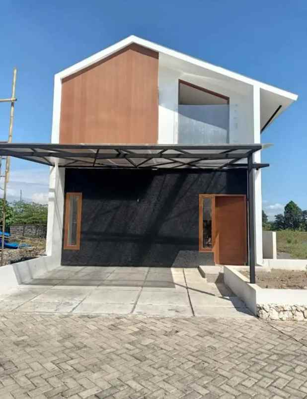 rumah 2 lantai modern bisa cicil developer