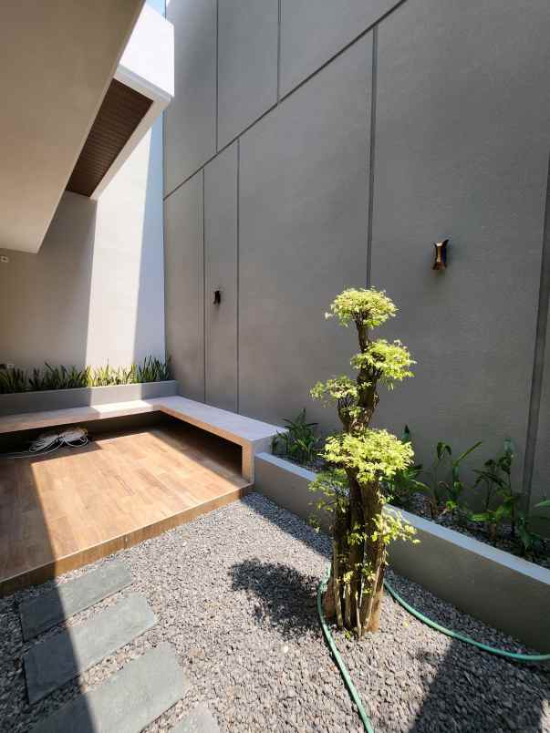 rumah baru woodland citraland surabaya barat