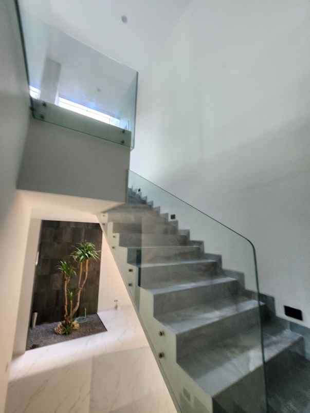 rumah baru woodland citraland surabaya barat