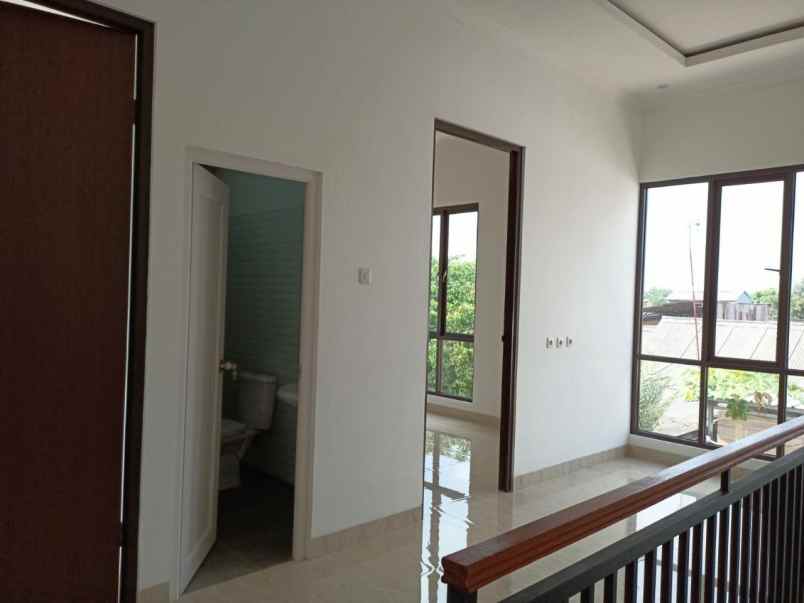 rumah bekasi dengan mezzanine bisa beli tanah