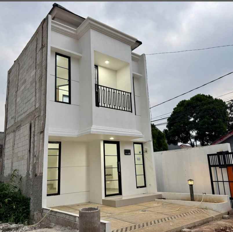 rumah cluster dekat stasiun depok baru
