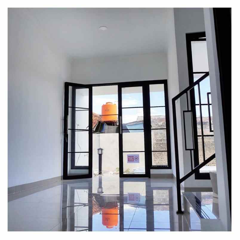 rumah cluster dekat stasiun depok baru