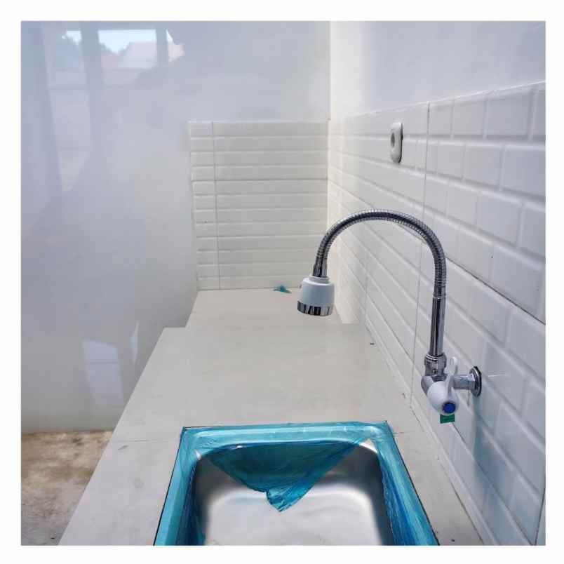 rumah cluster dekat stasiun depok baru