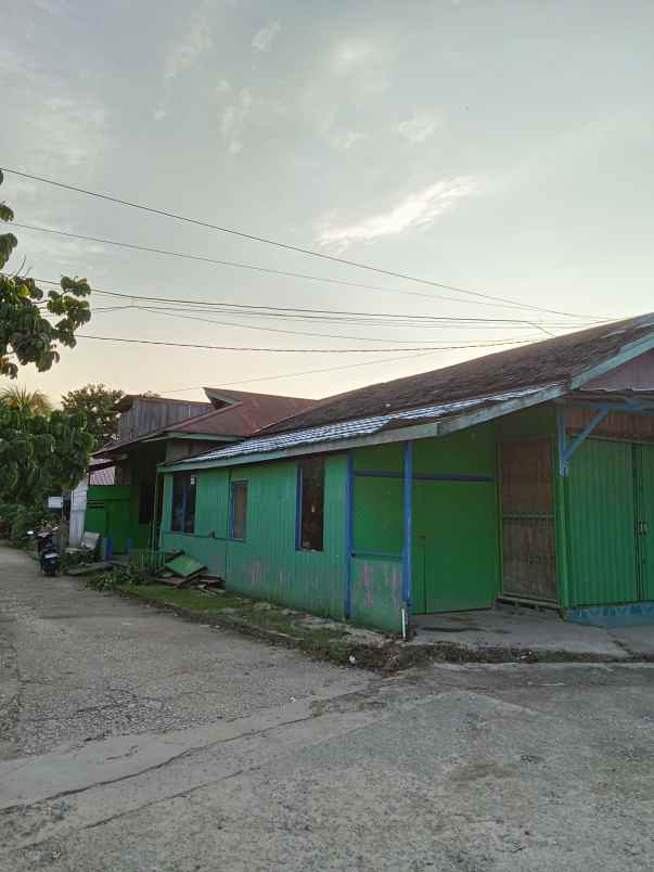 rumah ruko pinggir jalan