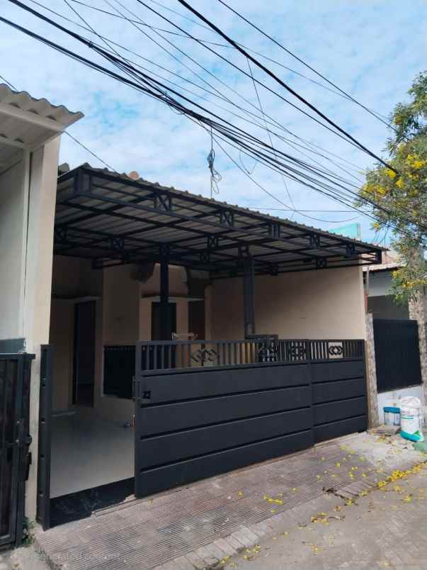 rumah taman wiguna siap huni strategis one gate sistem