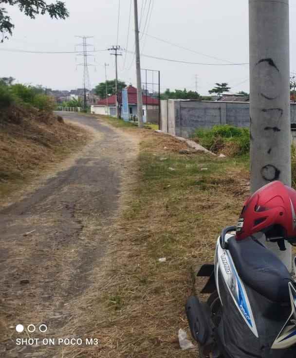 tanah kebun rata dan strategis samping perumahan