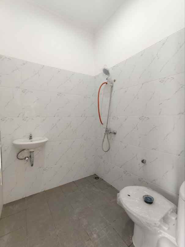 dijual rumah cluster harmony village