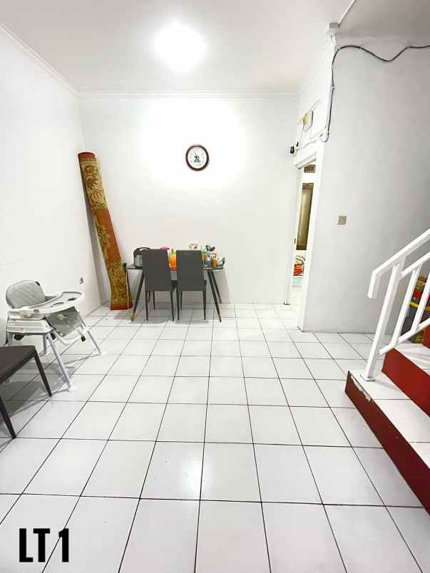 dijual rumah cluster mega regency